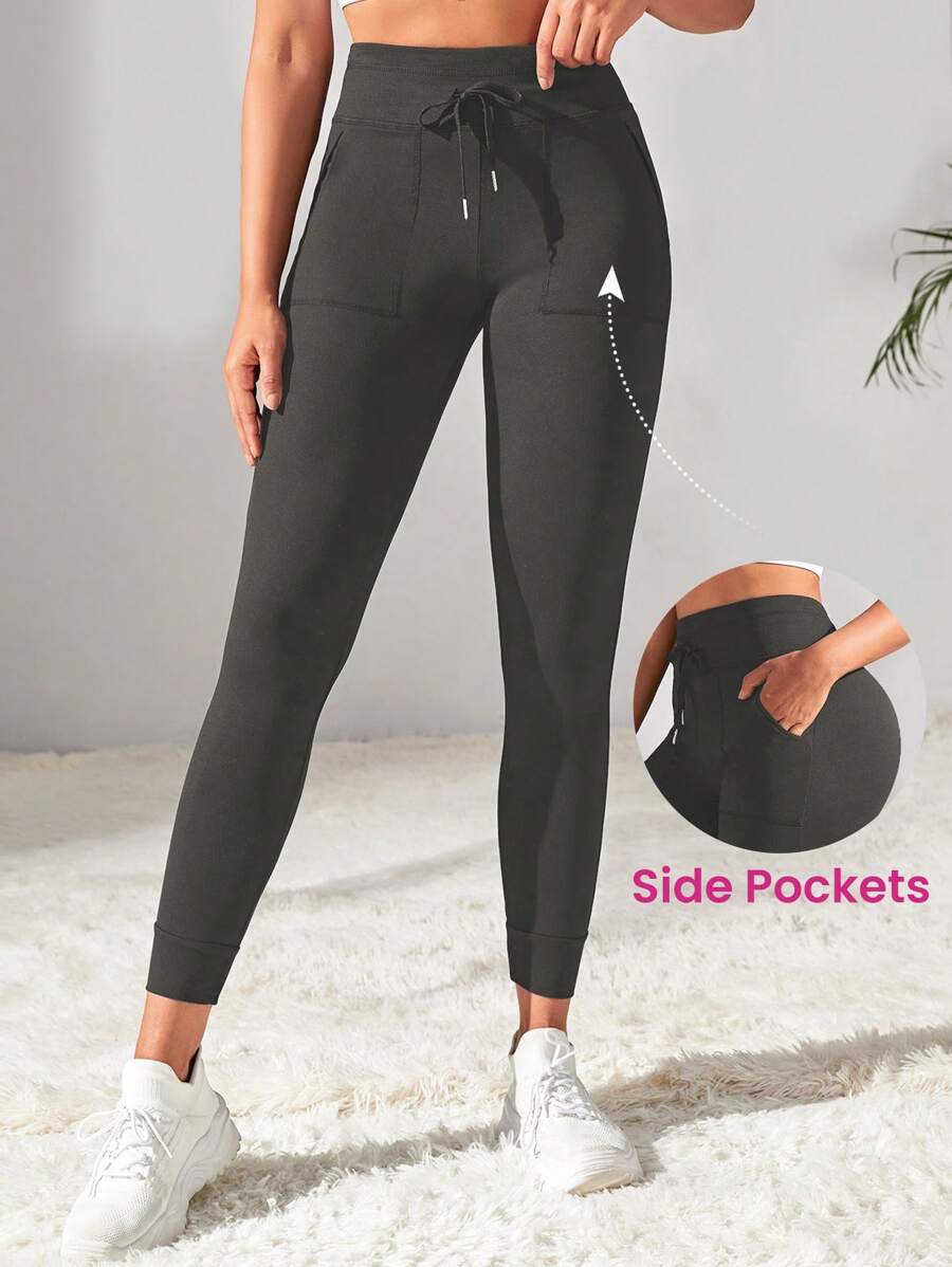 Easithlete 女式抽绳腰健身徒步紧身慢跑裤，带口袋和锥形袖口，适合跑步、骑自行车、瑜伽、泡菜球锻炼、日常穿着 - 黑色 - 查看 1