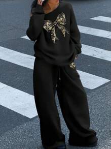 SHEIN EZwear 2 pièces ensemble femme: sweat-shirt ample à col large avec décoration en nœud, épaules dénudées et pantalon de survêtement à jambes larges. Doublure épaisse, convient pour l'automne/l'hiver