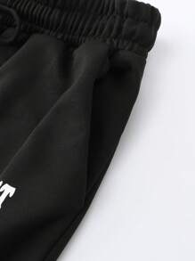 ROMWE MEN Street Life 男式标语印花抽绳腰喇叭运动裤 - 黑色 - 查看 4