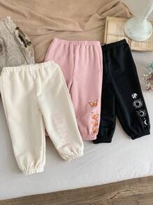 SHEIN Set de 3 pantalones de niña bebé con diseño de patrones de dibujos animados y cintura elástica, adecuados para otoño/invierno