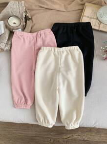 SHEIN Set de 3 pantalones de niña bebé con diseño de patrones de dibujos animados y cintura elástica, adecuados para otoño/invierno