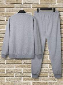 Manfinity Sport Corelite Conjunto deportivo minimalista para hombres con camiseta de cuello redondo de manga larga y pantalones estampados