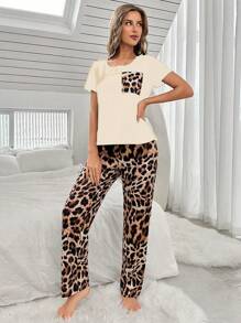 CoupledUp Leopard Pocket Short Sleeve Top And Leopard Print Pants Pajama Set