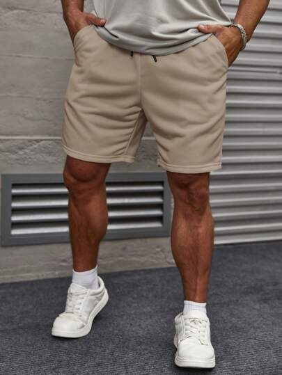 Manfinity RelaxMax Pantalones cortos casuales sueltos para hombres con cintura con cordón y bolsillos