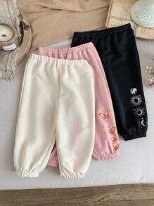 SHEIN Set de 3 pantalones de niña bebé con diseño de patrones de dibujos animados y cintura elástica, adecuados para otoño/invierno