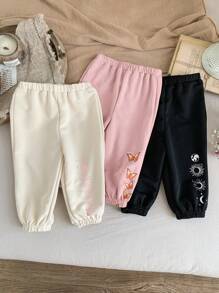 SHEIN Set de 3 pantalones de niña bebé con diseño de patrones de dibujos animados y cintura elástica, adecuados para otoño/invierno