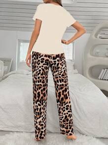 CoupledUp Leopard Pocket Short Sleeve Top And Leopard Print Pants Pajama Set