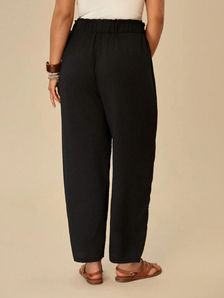 Travachic Talla grande Pantalones de cintura con volante con nudo delantero - Negro - Añade 2