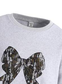 Conjunto de 2 piezas de top casual de manga larga con cuello redondo y estampado de moños y pantalones para niñas adolescentes