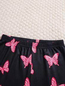 SHEIN Conjunto de pijama casual y cómodo para niña preadolescente de 2 piezas, con pantalón y camiseta de manga larga de ajuste ceñido, estampado minimalista de mariposa que brilla en la oscuridad y cuello redondo con hombros caídos
