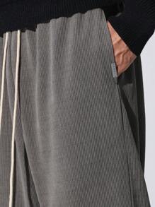 SUMWON Pantalones de chándal tipo cargo atléticos con textura acanalada, cómodos para el invierno, pantalones de entrenamiento con bolsillos laterales, para uso casual y diario, colección de otoño