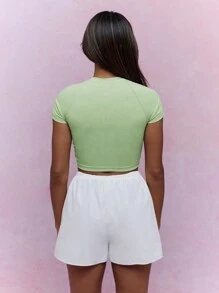 MISSGUIDED Lucky Charm Athletic Crop Top Short Sleeve Workout Running Yoga Shirt Green Fitted Raglan Sport Training Saint Patrick's Day Stretch Performance Wear