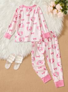 Young Girl Bow Print Crew Neck Long Sleeve Pajama Set: Top And Bottoms