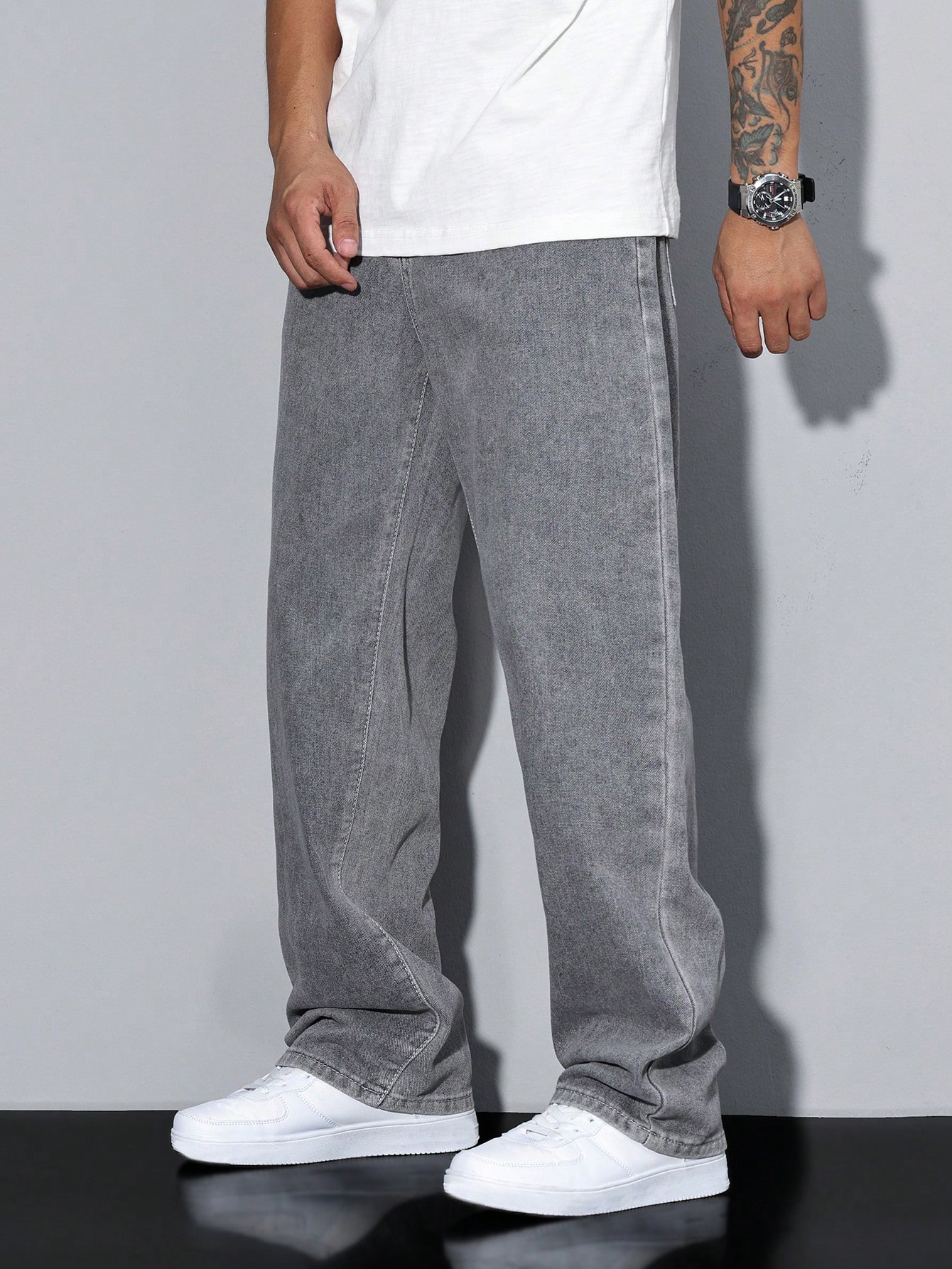 Manfinity Homme سراويل جينز رجالي فضفاضة ذات جيب م...