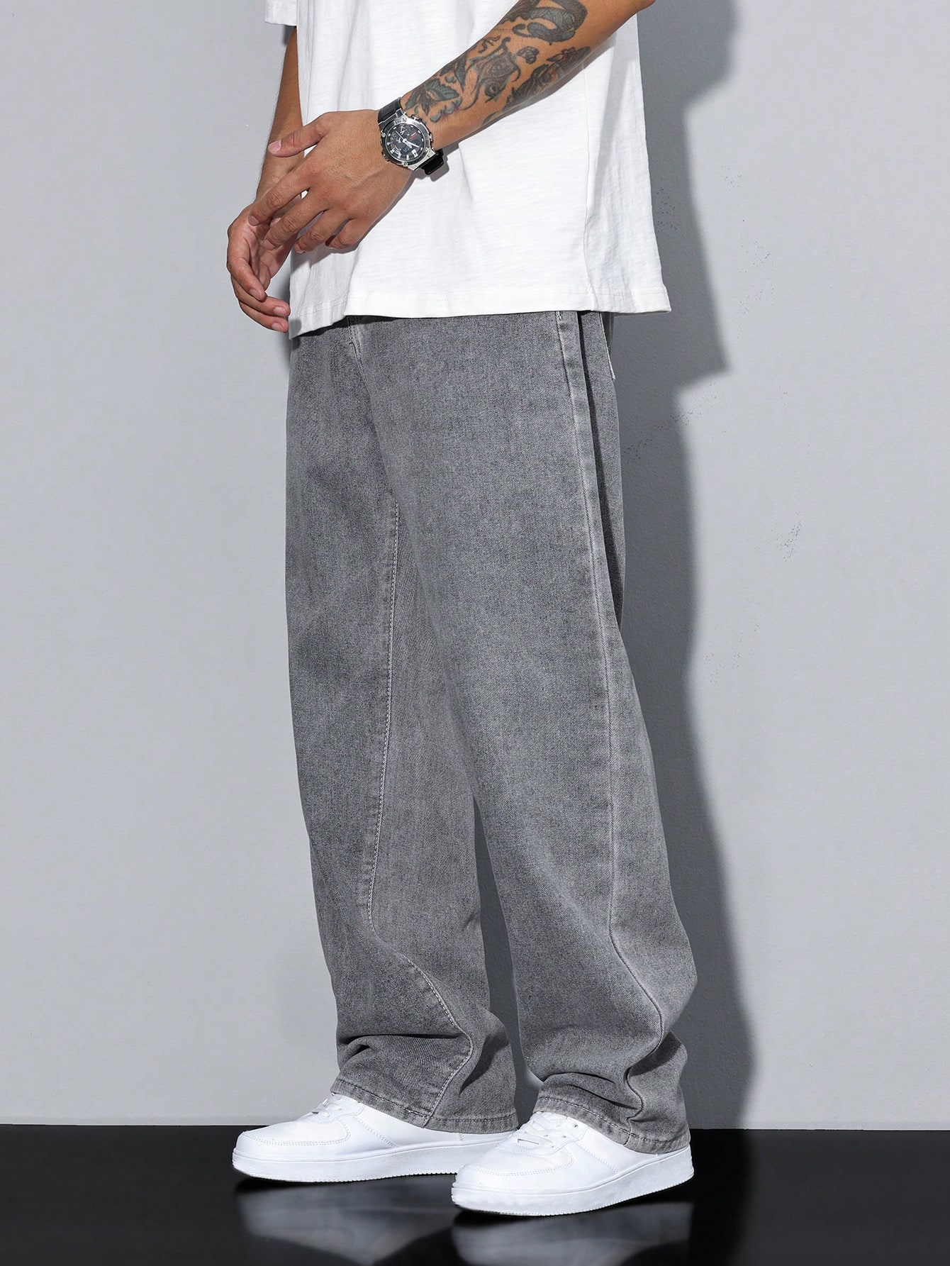 Manfinity Homme سراويل جينز رجالي فضفاضة ذات جيب م...