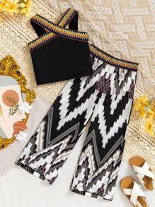 年轻女孩细肩带上衣和长裤 2 件套