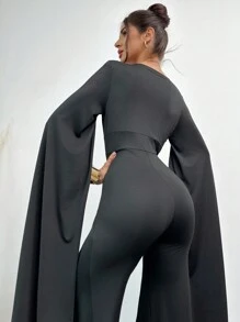 Firerie New Year Women's Elegant Minimalist V-Neck Long Sleeve Jumpsuit With Slit, Cinched Waist, Flared Leg, Black Slim Fit, Suitable For Party And Banquet