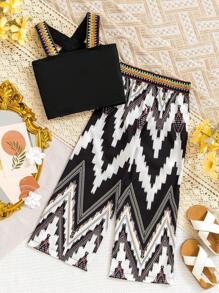 年轻女孩细肩带上衣和长裤 2 件套