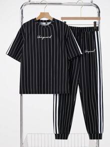 SHEIN Leap Crew 2pcs Set Teen Boy'sCasual Splicing Colour Collision Ribbons Black And White Vertical Stripes With Handwritten Letters In English Printed Round Neck Short Sleeve T-Shirt Trousers Two-Piece Set;Spring Wear; Teen Boys' Clothing; Teen Boy' Jackets, Spring Back To School - Black - View 1