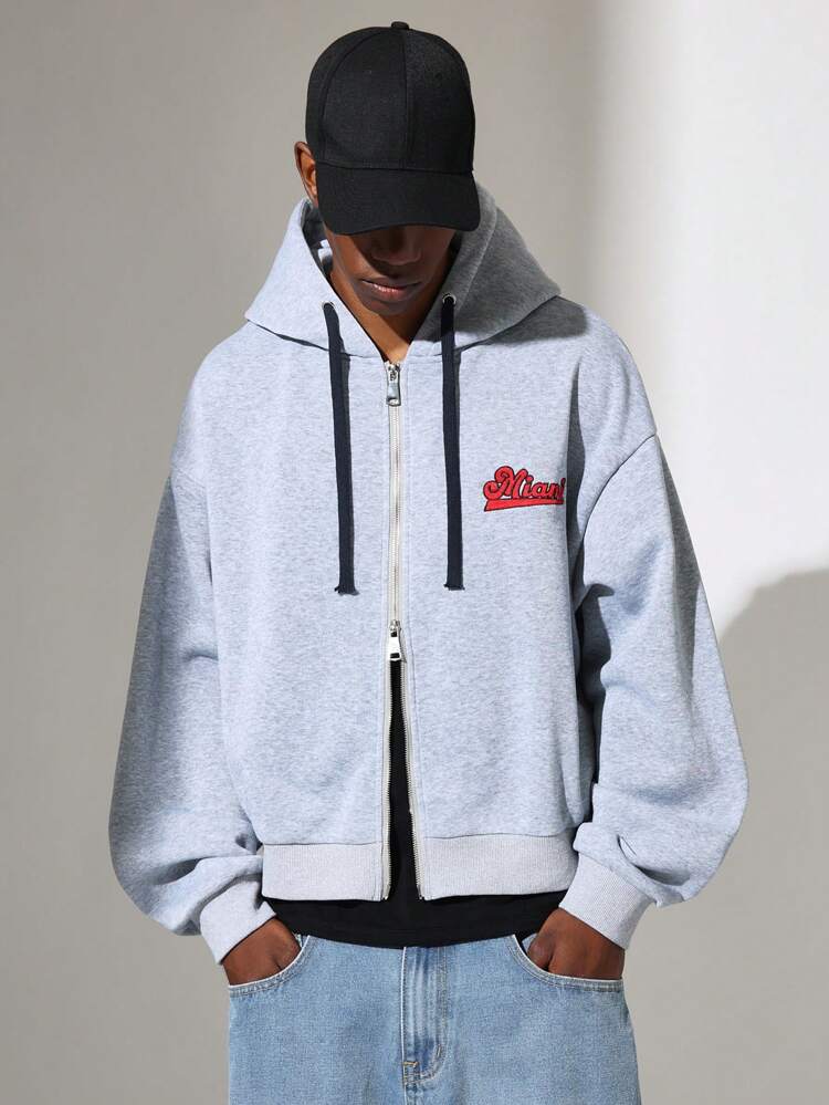 Oversize'owa sportowa bluza z kapturem zapinana na zamek