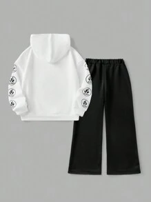 SHEIN Bộ quần áo nỉ trùm đầu và quần dài hai mảnh phong cách Goth Grunge màu đen cho bé gái tuổi teen mùa thu/đông có họa tiết in cho lễ Halloween - Đen và trắng - Xem 2