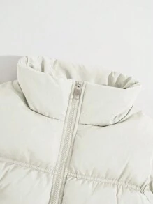 Flirla Chaleco acolchado casual de invierno para mujer con cierre de cremallera, cuello y bolsillos