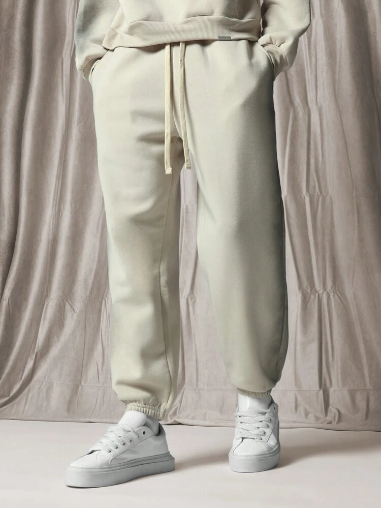 Calça de moletom jogger com cordão e punhos