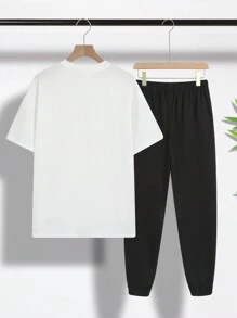 SHEIN 2pcs/Set Teen Boys Casual Streetwear Sports Outfit, White T-Shirt With Graphic Print And Black Jogger Pants
