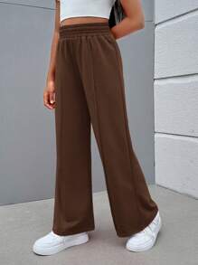 SHEIN Spodnie w jednolitym kolorze z dzianiny w stylu ulicznym dla dziewcząt w wieku od 1 do 2 lat