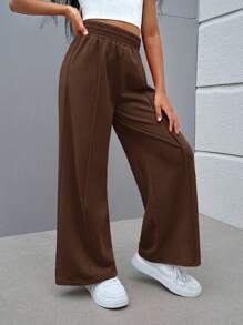 SHEIN Spodnie w jednolitym kolorze z dzianiny w stylu ulicznym dla dziewcząt w wieku od 1 do 2 lat