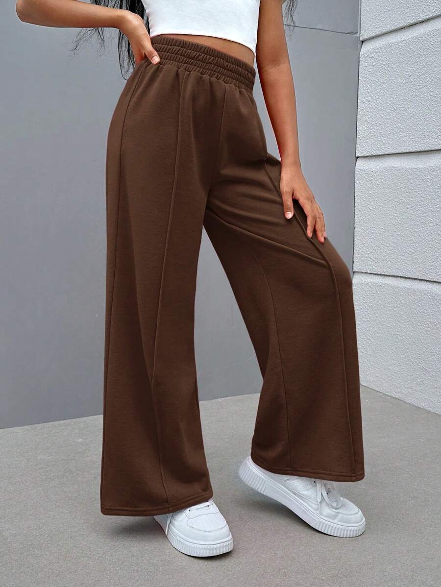 SHEIN Spodnie w jednolitym kolorze z dzianiny w stylu ulicznym dla dziewcząt w wieku od 1 do 2 lat