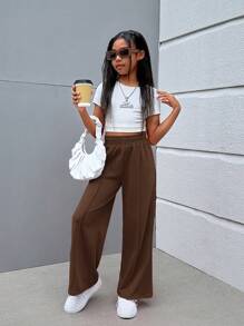 SHEIN Spodnie w jednolitym kolorze z dzianiny w stylu ulicznym dla dziewcząt w wieku od 1 do 2 lat