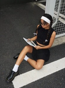 Bộ đồ thường ngày áo len cổ tròn buộc dây phía trước màu trơn và chân váy dệt kim dài ngang gối cho nữ - màu đen - Xem 4