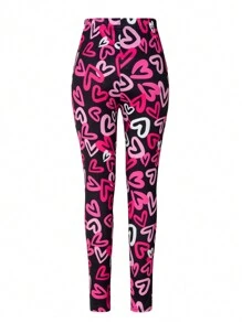 Leggings para niñas preadolescentes, marca Streecool preadolescente, leggings de ajuste ceñido de longitud completa con patrón de corazones en color rosa y negro, diseño elegante y dinámico, adecuado para deportes, escuela, actividades al aire libre y uso en todas las estaciones. Los leggings presentan una combinación de color rosa y negro con un diseño de patrón de corazones de cobertura total