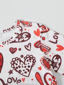 Conjunto de 3 piezas para niñas preadolescentes con: top corto de manga larga con estampado de corazones graffiti, camiseta sin mangas de unicolor y pantalón cargo para Día de San Valentín