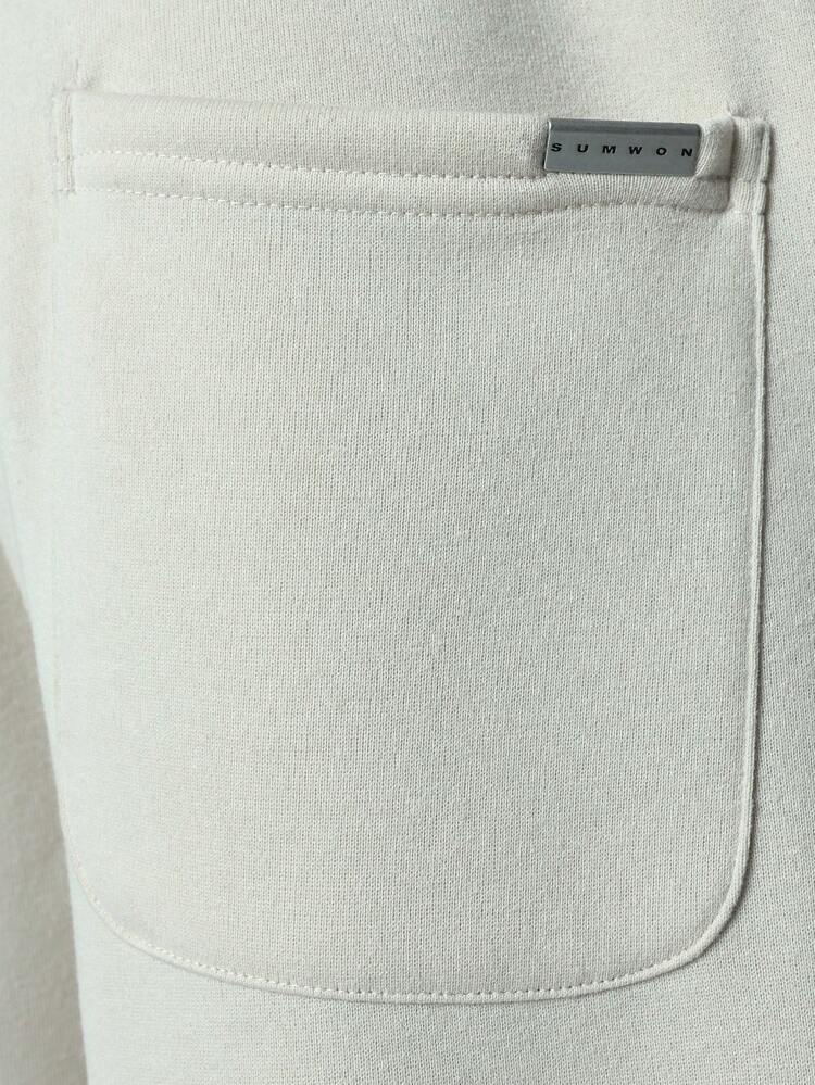 Calça de moletom jogger com cordão e punhos