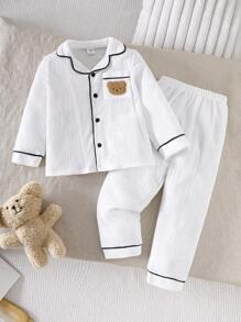 SHEIN Young Boy Simple Casual Cute Bear Patched Pocket Turndown Collar Open Front Long Sleeve Knit Jacquard Long Pants 2 Pieces Pajama Set