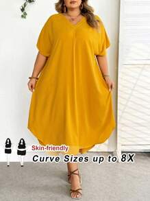 SHEIN CURVE+ Vestido casual de playa de talla grande de unicolor con cuello en V