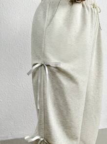 SHEIN Frenchy Pantalón de chándal gris cómodo y holgado con diseño de lazo para tallas grandes