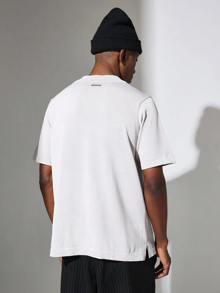 Suéter de malha polo com manga curta e botões