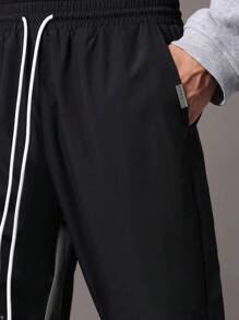 SUMWON Flare Fit Colour Block Panel Nylon Pants With Paint Splatter - Black - View 7