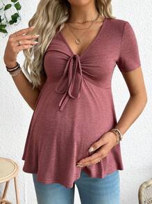 SHEIN Camiseta casual de manga corta con nudo delantero y unicolor para embarazadas