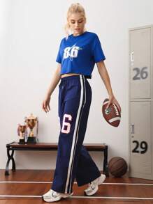 SHEIN Sports Camiseta deportiva casual de mujer con cuello redondo y manga corta, con estampado minimalista de números, para uso escolar y diario - Azul y blanco - Ver 4