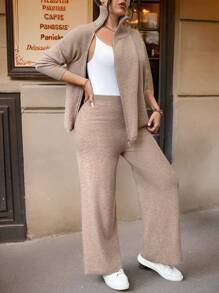 Calvaya Ensemble de Top en tricot à manches longues avec fermeture éclair avant de couleur unie et pantalon long, grande taille