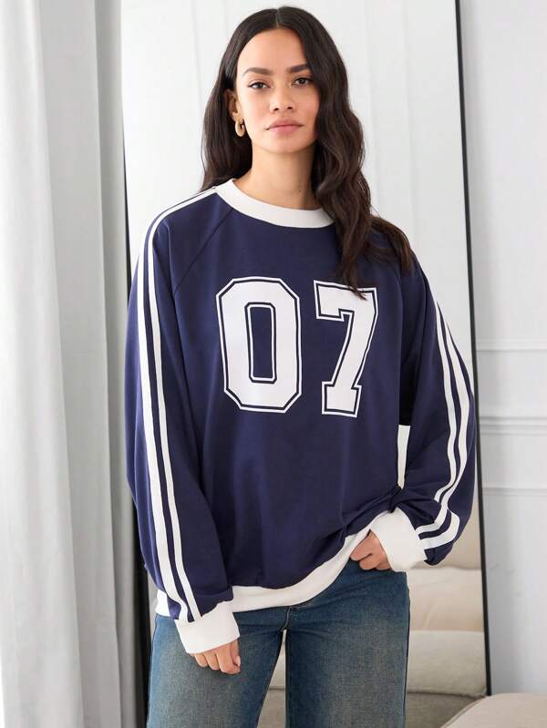 Manfinity VCAY Sudadera unisex de cuello redondo de manga raglán con estampado gráfico numérico y parches, para otoño e invierno