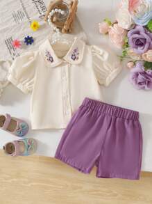 SHEIN Vintaside Kids Bộ 2 áo thun tay bèo cổ polo thêu hoa cho bé gái và quần short cạp chun, trang phục thường ngày dễ thương thoải mái cho mùa xuân, mùa hè, mùa thu, thích hợp cho cả trong nhà và ngoài trời - Nhiều màu - Xem 2