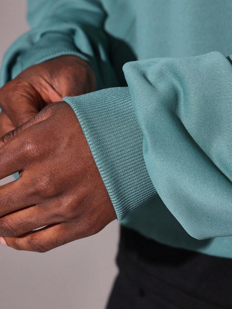 오버사이즈 풀오버 센터 포켓 후드 티셔츠