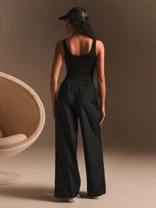 Athîral Pantalón de chándal informal suelto de pierna ancha con bolsillos y cordón en la cintura de color liso para mujeres