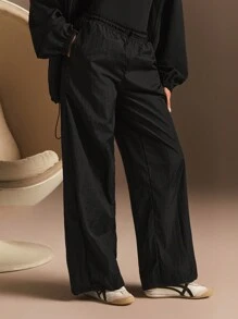 Athîral Pantalón de chándal informal suelto de pierna ancha con bolsillos y cordón en la cintura de color liso para mujeres