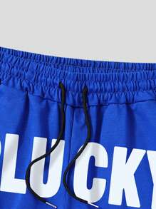 Manfinity Homme Manfinity Men's Casual Front Tie Pocket Letter Print Shorts